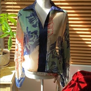 Atina Cristina Beautiful flowy pullover blouse.